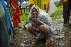 Family members of this woman were trapped under rubble after a landslide washed away houses in western India, July 2023