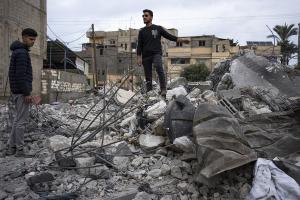 Rafah, Gaza, sole survivor on debris from Israeli airstrike meant to rescue hostages.