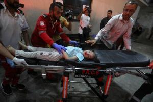 On April 19, 2024, an Israeli strike on a house in Rafah killed at least 10 people, including six children, according to hospital authorities. Child who was hit is being brought on stretcher.
