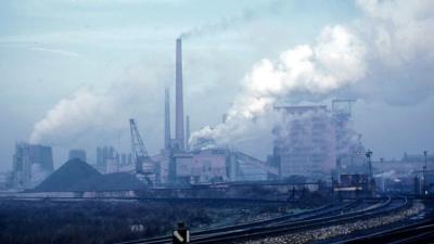 CO2 emissions/pollution from smokestacks at coal power plant.