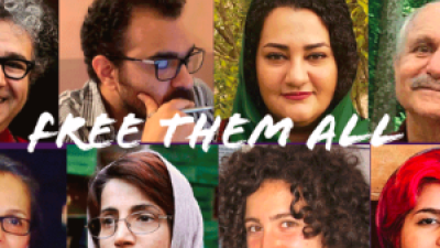 "Free them all" with pictures of Iranian political prisoners