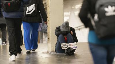 Homeless beg for help in New York City subway.