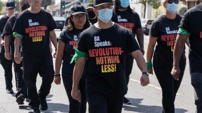 Members of LA REVCOM CORPS march on 30th anniversary of LA rebellion.