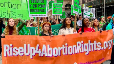 Rise Up 4 Abortion Rights banner in march