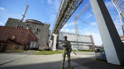 Russian soldier guards Zaporizhzhia nuclear power plant in Ukraine.
