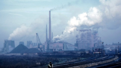 CO2 emissions/pollution from smokestacks at coal power plant.