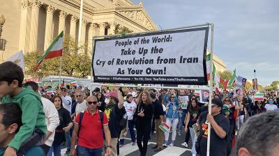 Washington, DC, Supreme Court, October 22, 2022: RevComs carry banner to People of the World Support Iran