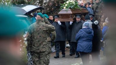 Polish carry casket of men killed by missile, November 12, 2022.