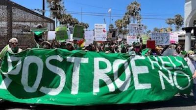 Protest banner: Post Roe Hell No
