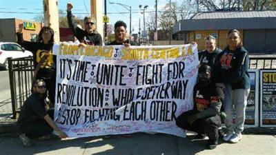 BChicago Revolution Club with banner, that says in part, "...There's a Whole Better Way, Unite, Don't Fight Each Other."