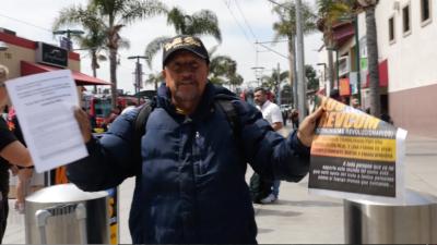 Helping the REVCOMS distribute the broadsheet.