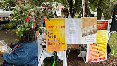 Table at Logan Square Market, Chicago, on Hiroshima Day, August 6, 2023.