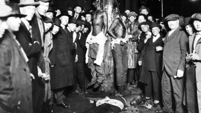 A postcard, a popular souvenir, showed a crowd of thousands of whites watching as three Black men were lynched, Duluth, Minnesota, June 15, 1920.