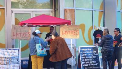 At a Los Angeles farmers market December 10 raising funds for the revolution with anti-Zionist, pro-Palestinian latkes!