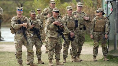 Texas National Guard in camouflage, at the Mexican border