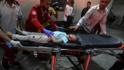 On April 19, 2024, an Israeli strike on a house in Rafah killed at least 10 people, including six children, according to hospital authorities. Child who was hit is being brought on stretcher.