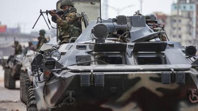 Bangladeshi military in armored tanks patrol the streets of Dhaka, Bangladesh after student protests, July 20, 2024.
