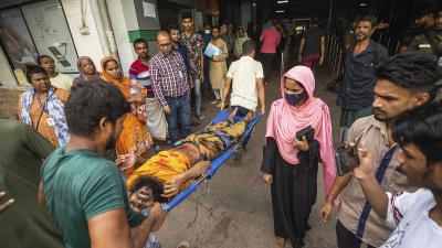 A Bangladesh student wounded in clash with police is brought to hospital, July 20, 2024.