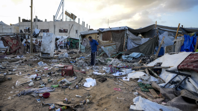 Palestinians inspect damage at tent area, September 9, 2024.