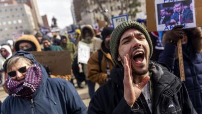 Lansing, Michigan, February 17, 2025, protest, guy chanting.