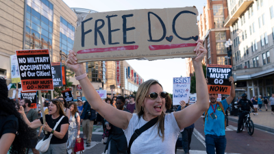 People protest Trump’s use of federal law enforcement and National Guard troops, August 22, 2025.