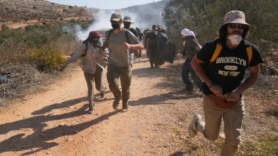 The Israeli army uses tear gas to disperse Palestinians from harvesting their olives, October 28, 2025.