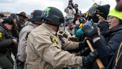 Cops push protesters at ICE detention center, Broadview, IL, November 1, 2025.