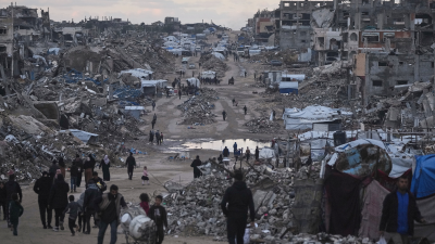 Palestinians return to destroyed buildings in the northern Gaza Strip, January 2, 2026.