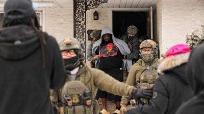 Garrison Gibson is arrested by federal immigration officers in Minneapolis, January 11