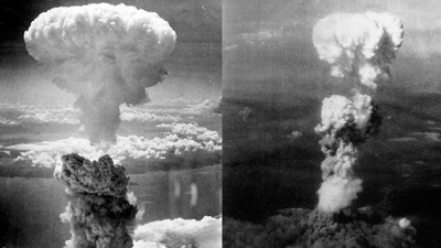 Mushroom clouds caused by nuclear bombs dropped on Hiroshima and Nagasaki.