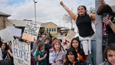Students protest ICE outside the Pflugerville, Texas Justice Center after walking out of their classes, February 2, 2026.