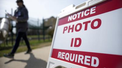 Photo ID Required sign in front of North Carolina voting location, March 5, 2024.