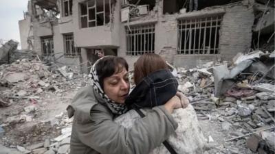 Iran - two women after bombing by U.S.