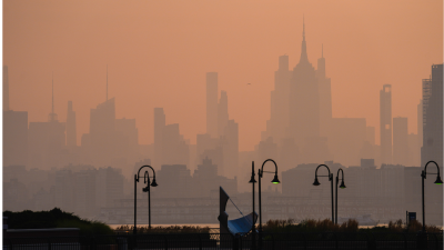 The New York City skyline through a cover of Canadian wildfire smoke, July 17, 2026.