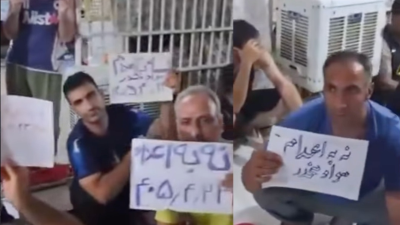 Many handwritten signs read “No to Executions,” Ghezel Hesar prison, Iran, July 25, 2026. (Credit: @burnthecage)