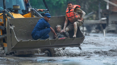 Rescuing a victim of flash flooding along the Trishuli River in Nepal, August 26, 2026.