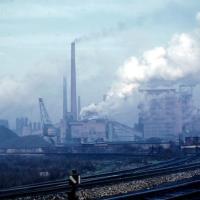 CO2 emissions/pollution from smokestacks at coal power plant.