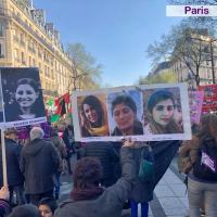 Paris International Women's Day posters of women demanding Free All Political Prisoners In Iran Now