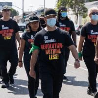 Members of LA REVCOM CORPS march on 30th anniversary of LA rebellion.