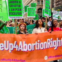 Rise Up 4 Abortion Rights banner in march