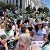 Abortion rights sit in in Washington, D.C., June 30