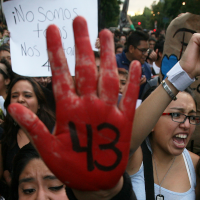 People protest the disappearance of 43 students in Mexico City, October 22, 2014.