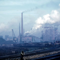 CO2 emissions/pollution from smokestacks at coal power plant.