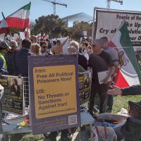 Washington, DC, October 22, 2022: People of the World banner and posters at rally