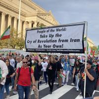 Washington, DC, Supreme Court, October 22, 2022: RevComs carry banner to People of the World Support Iran