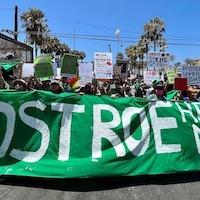 Protest banner: Post Roe Hell No