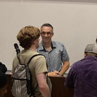 Mingling after Sunsara Taylor’s talk “Woke Lunacy vs Real Revolution” at UCLA, May 24, 2023.