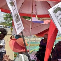 Getting into discussions about Iran with people at a street market in Cali, Colombia.