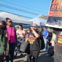 People turning their heads to hear the revcoms' message