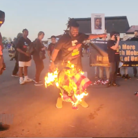Flagburning at Jason Aldean concert, Tinley Park.